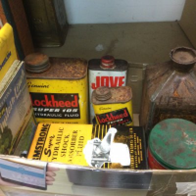 Two boxes of vintage motoring related tins and three road maps (2). Shipping category D.