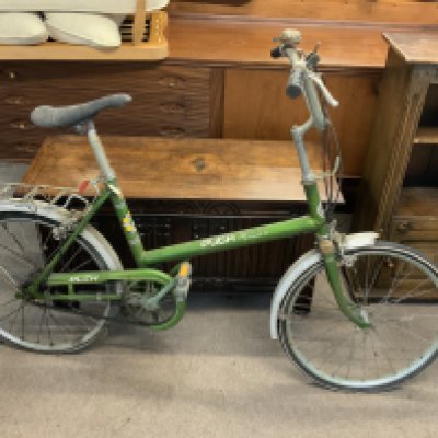 A vintage Puch promenade 20 bicycle.