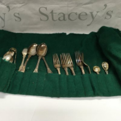 A collection of silver plated dinnerware.