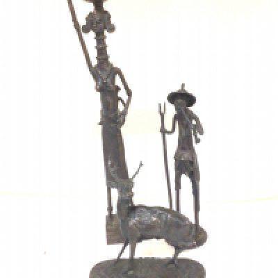 Two 20th century African bronze figures and a bronze of a stag (3) Hight 45cm.