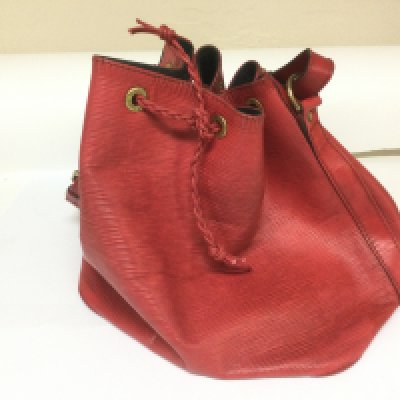 WITHDRAWN - A red Louise Vuitton bag. Shipping category B.