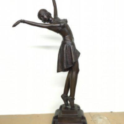 A bronze Art Deco style dancer figure, by Romanian sculptor Demetre Chiparus. 74cm tall approximately. This lot cannot be posted