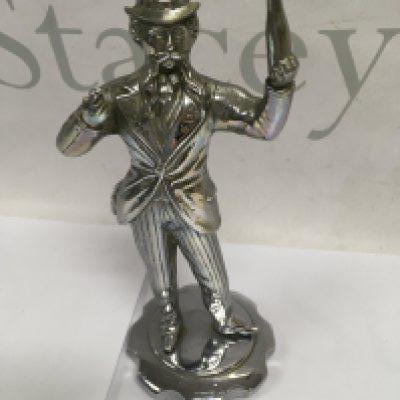 A car Mascot in the form of a Victorian gentlemen Holding a bottle. 19 cm