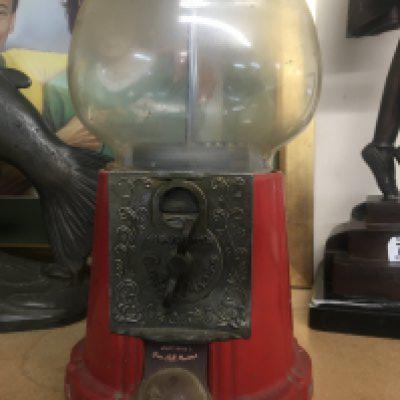 A Vintage bubble gum machine.