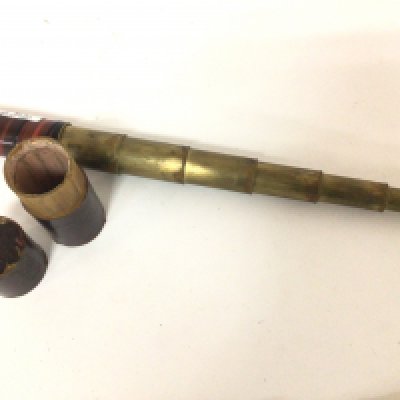 A seven drawer brass and walnut and ebony wood finish small telescope. Maker JR & H Stebbington Southampton with an outer case overall length 40cm