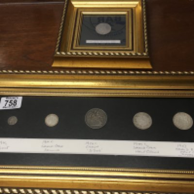 Two frames containing used circulated Victorian coins.