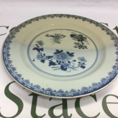 A Chinese blue and white dish decorated with floral sprays, approx diameter 23cm. Shipping category D. NO RESERVE