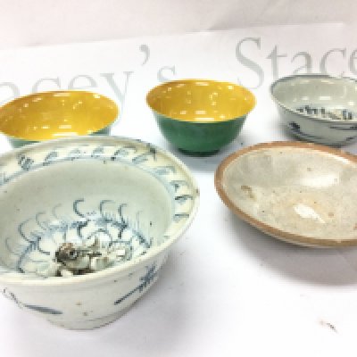 A collection of Chinese bowls including yellow and green glaze, blue and white frog bowl . This lot cannot be posted