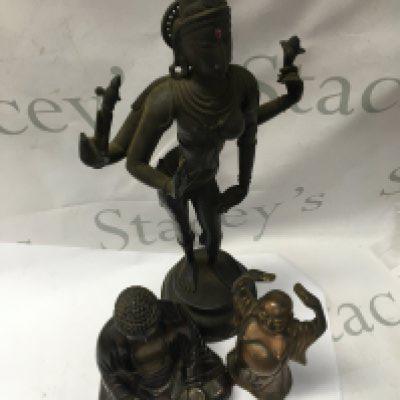 A bronzed Deity and two Buddhas .