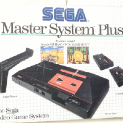 A boxed Sega Master System Plus. Includes controllers..tv switch..cable and light phaser gun. No reserve.