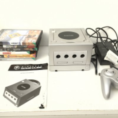 A Nintendo GameCube ..includes controller..power supply..manual and boxed games discs. No reserve.