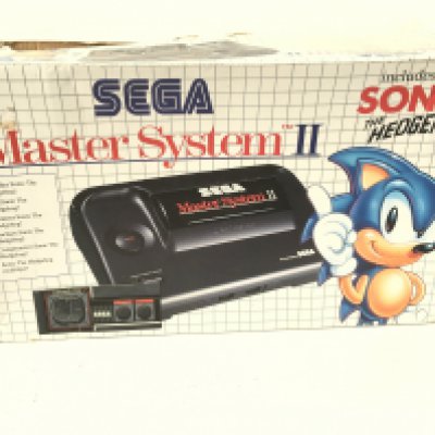 A boxed SEGA Master System II includes 3x games cartridges..controller..cables. No reserve.