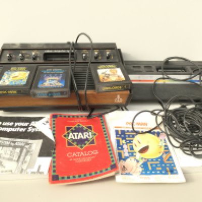 2x Atari 2600 video computer system includes manual..joystick ..cables and 3x games cartridges. No reserve