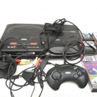 A Sega Mega Drive II . Includes controller..power supply..cables..game cartridges. No reserve