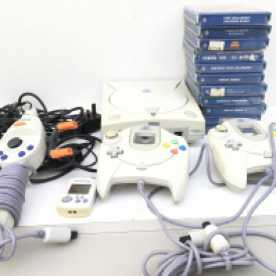 A SEGA DREAMCAST. Includes controllers ..a Fission controller..cables and numerous boxed games. No reserve.