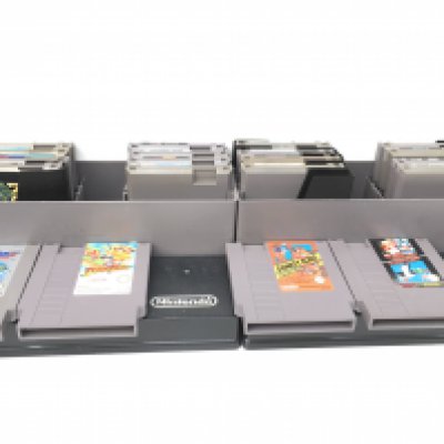 Collection of 20x Nintendo games cartridges in two Nintendo storage boxes. No reserve