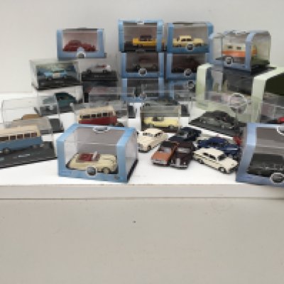 A collection in excess of 30 diecast model vehicles by Oxford..Many are with display boxes. Mainly 1:76 scale. No reserve.