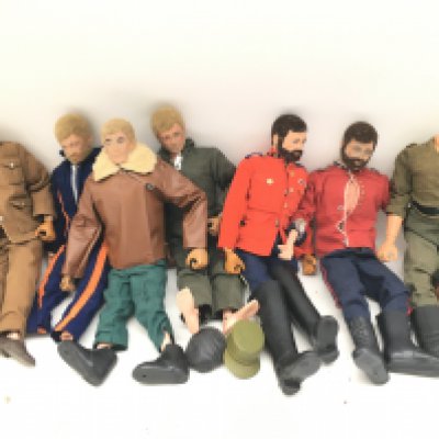 A Collection of 7 Playworn Action Men in Various States. No Reserve.