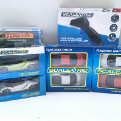 7 Boxed Scalextric Cars And A Boxed Hand Controller.