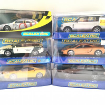 6 Boxed Scalextric Cars. Including 2 Range Rovers. McLaren MP4-12C. A Ferrari F430. A Alfa Romeo 159 and A Audi A4.