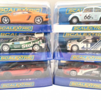 6 Boxed Scalextric Cars Including a Lamborghini. A Ford Focus. A McLaren MP4-12 C. A Volkswagen Beetle. A Ford R/S200 And A Ferrari F430 GT.