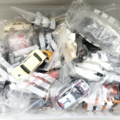 A Box Containing Scaextric Parts And Spares.