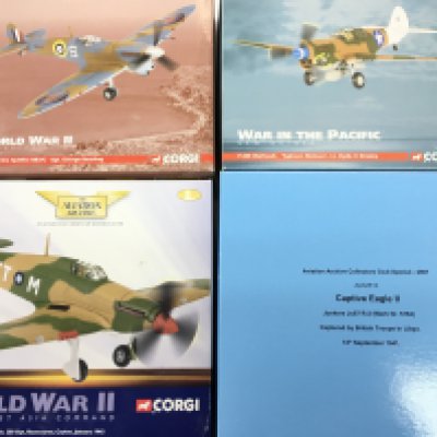 4 X Boxed Corgi Aviation Archive Diecast Aircraft. A Hawker Hurricane. A Captive Eagle II. A P-40E Warhawk and A Supermarine Spitfire. 1/72 Scale. No Reserve. (4).