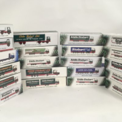 A Collection of 21 boxed Eddie Stobart themed commercial vehicles by Atlas and others. No Reserve