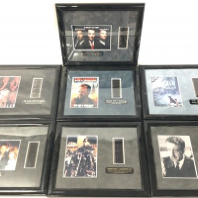 A Collection of Various Framed Movie Film Cells Including Terminator. Diehard With Vengence. Goodfellas. The Jungle Book Etc.