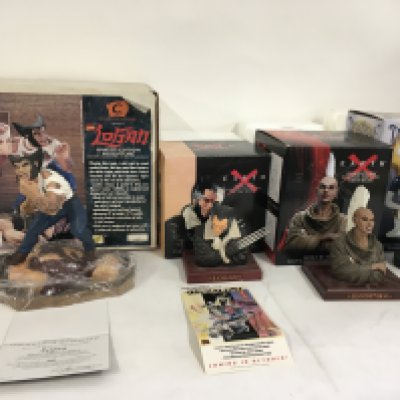 A collection of 4 Marvel superhero sculptures including..Logan x2.. Bloodstorm and Mystique. No reserve.