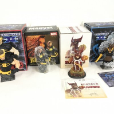 A collection of 4 boxed Marvel superhero sculptures featuring Cyclops..Jean Grey..Sunfire..Storm. No reserve