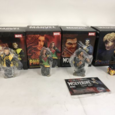 A collection of 4 boxed Marvel superhero sculptures including Cyclops..Phoenix..Wolverine and Longshot. No reserve