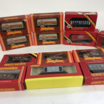 A collection of 13x boxed 00 gauge wagons by Hornby. No reserve