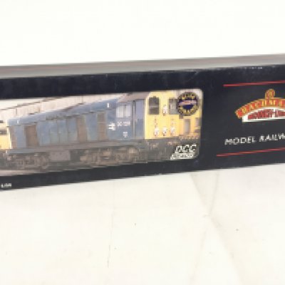 A boxed 00 gauge DCC ready locomotive by Bachmann featuring 32.032. A class 20 diesel weathered. No reserve