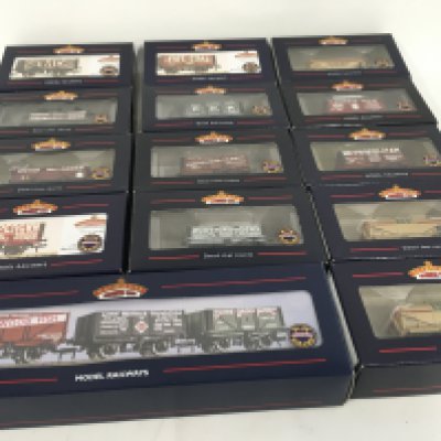 A collection of 14 boxed 00 gauge model railway wagons by Bachmann. No reserve.