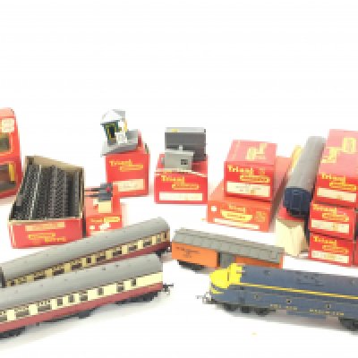A Collection of Boxed And Loose Trai-Ang 00 Gauge Coaches. Wagons. And 1 Loco.