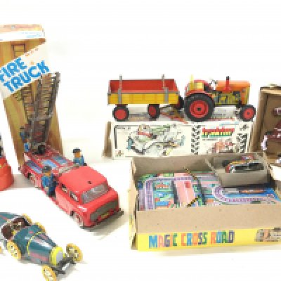 A Collection of Various Boxed And Loose Tinplate Toys. And A Vintage Cowboy Toy Watch.