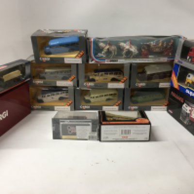 A collection in excess of 10 boxed model diecast vehicles mainly buses. Also includes plastic model of queens jubilee coach with horses. Mostly by Corgi..EFE. No reserve
