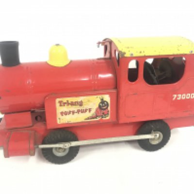 A Tri-Ang Puff Puff pull Along Locomotive.