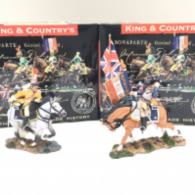 2 X Boxed King And Country Napoleonics Mounted Figures. A Wounded Flag-bearer And A Charging Trumpeter.