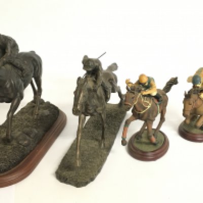 Race horse resin and emulated bronze figures. This lot cannot be posted