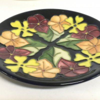 A Moorcroft dish, 16cm in diameter. No obvious damage or restoration this lot cannot be posted