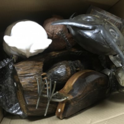 A collection of large owl figures including ceramic, wooden and other examples. This lot cannot be posted