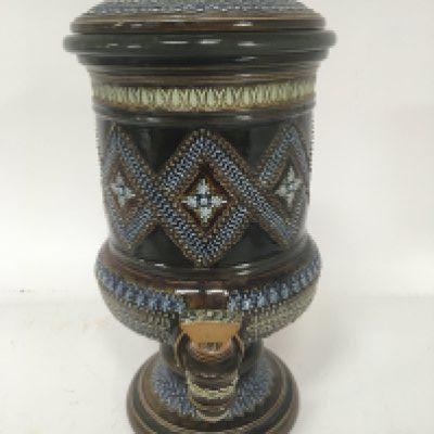 A Quality Victorian Lambeth Doulton stoneware water filter container. With lid with a raised pattern decoration no obvious damage. Height 36cm