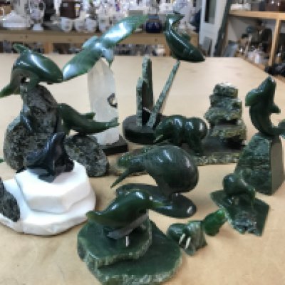 A collection of carved Jade sculptures- Limited edition including Playful Whales 2/150