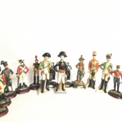 A collection of resin and porcelain British and French solider figures, this lot cannot be posted
