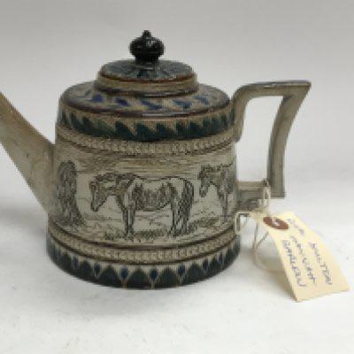 A Royal Doulton Hannah Barlow tea pot decorated with horses .12 cm A/F