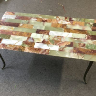 An Onyx coffee table , dimensions 90x46x42cm