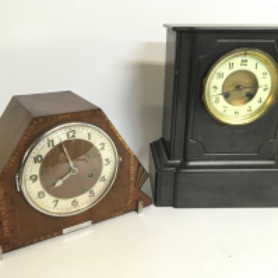 Mantle clocks including a slate clock and a wooden clock with inlaid design