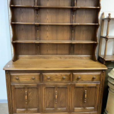 An Ercol Welsh Dresser 3 Drawers 2 Cupboards Shelving Golden Dawn. 146cm x 191cm x 50cm